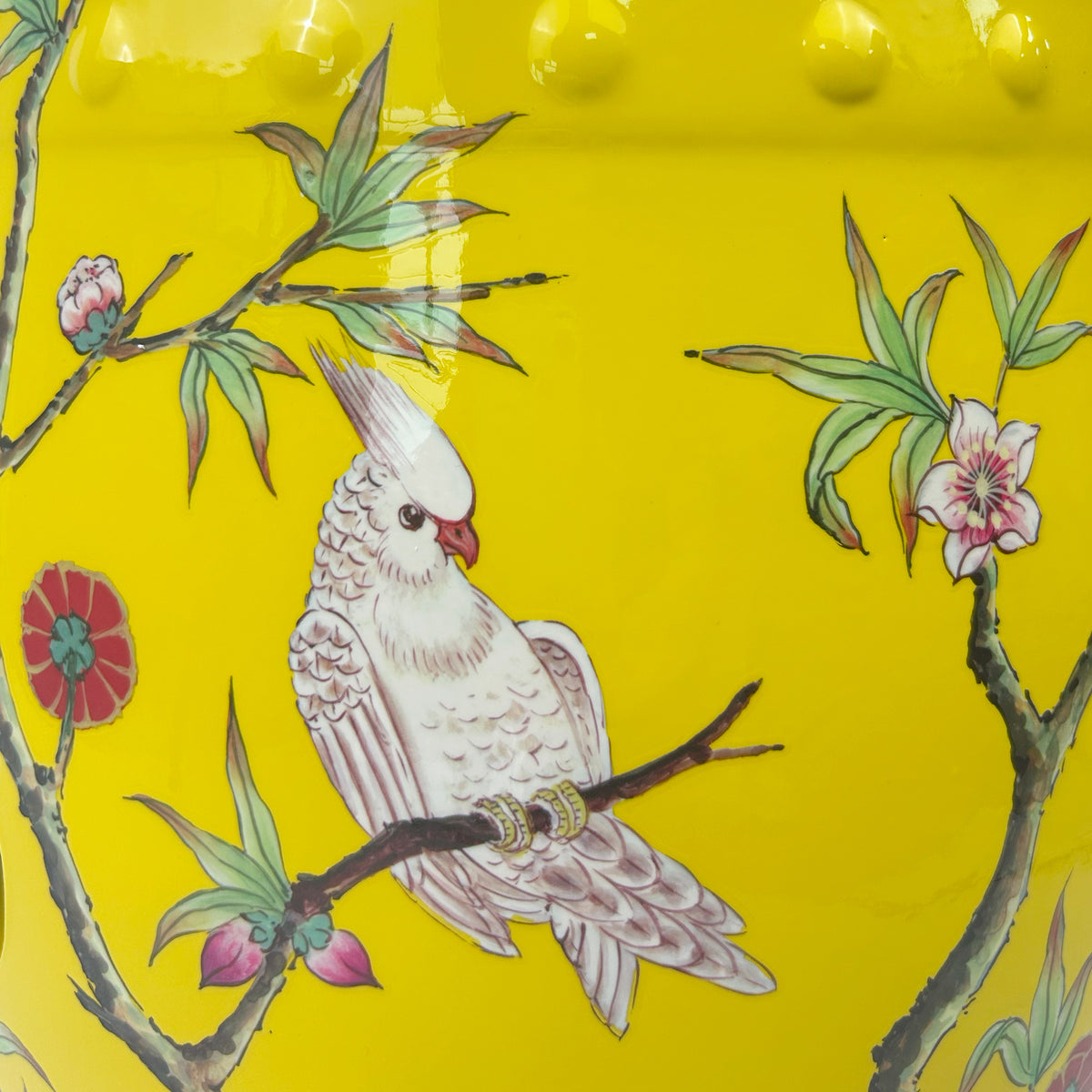Bright Yellow Ceramic Drum Stool Featuring Blossom Branches and Birds with Decorative Cut-outs